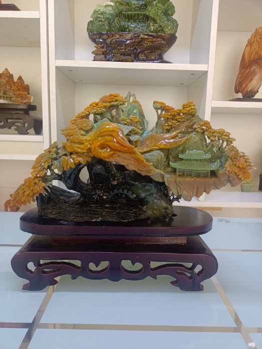 大业有成，财通四海    精雕花玉